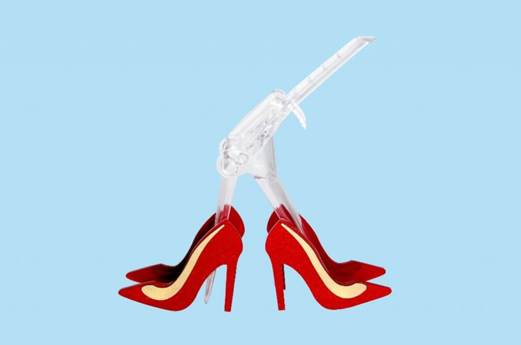 A speculum artwork - the speculum wears red high heels